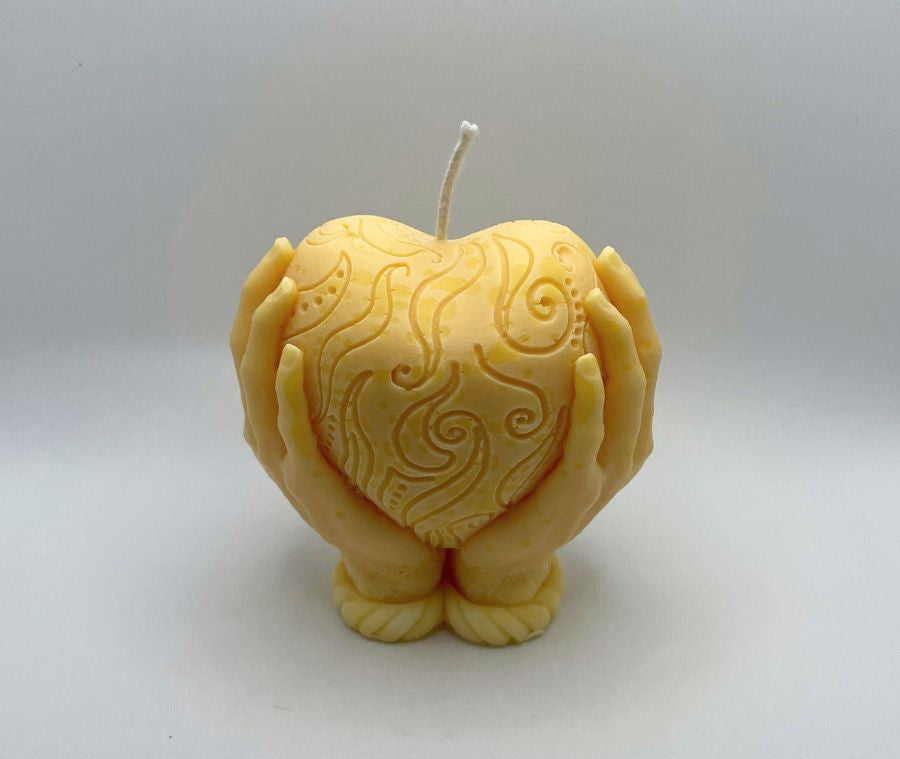 Vela de soja, corazon en mano
